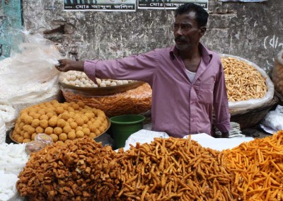 Street vendor saleing low priced sweets