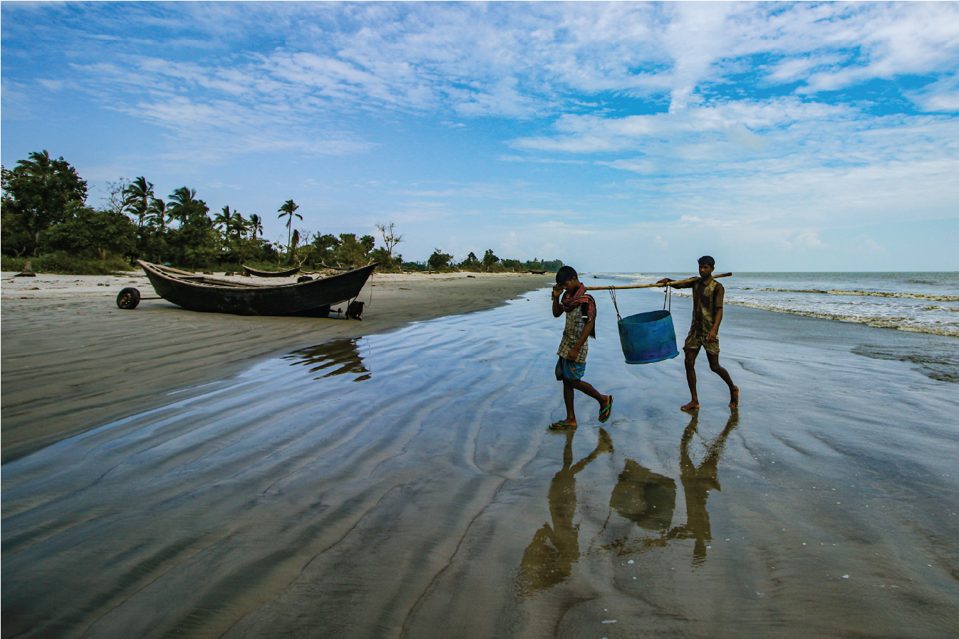 A foreign solo traveler and a local professional guide from Deshghuri exploring a historical site in Bangladesh in 2026